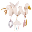 A plush swan-shaped baby activity spiral with a hanging rattle, cloud, and feathers in soft cream and pink tones.
