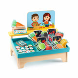 Djeco wooden fruit and vegetable market stall toy with play money, scale, and colorful produce for kids.