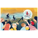 Flat lay view of open paper Little People Big Dreams mini book pages featuring colorful cinematic illustrations.