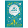 Book cover for The Little Prince by Antoine de Saint-Exupéry featuring a teal background with silver and gold celestial art.