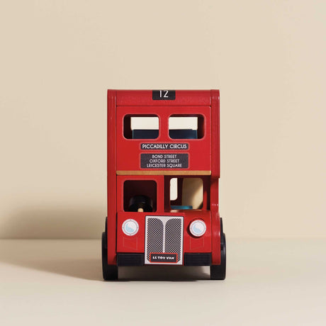 Front view of a classic red wooden double-decker London toy bus.