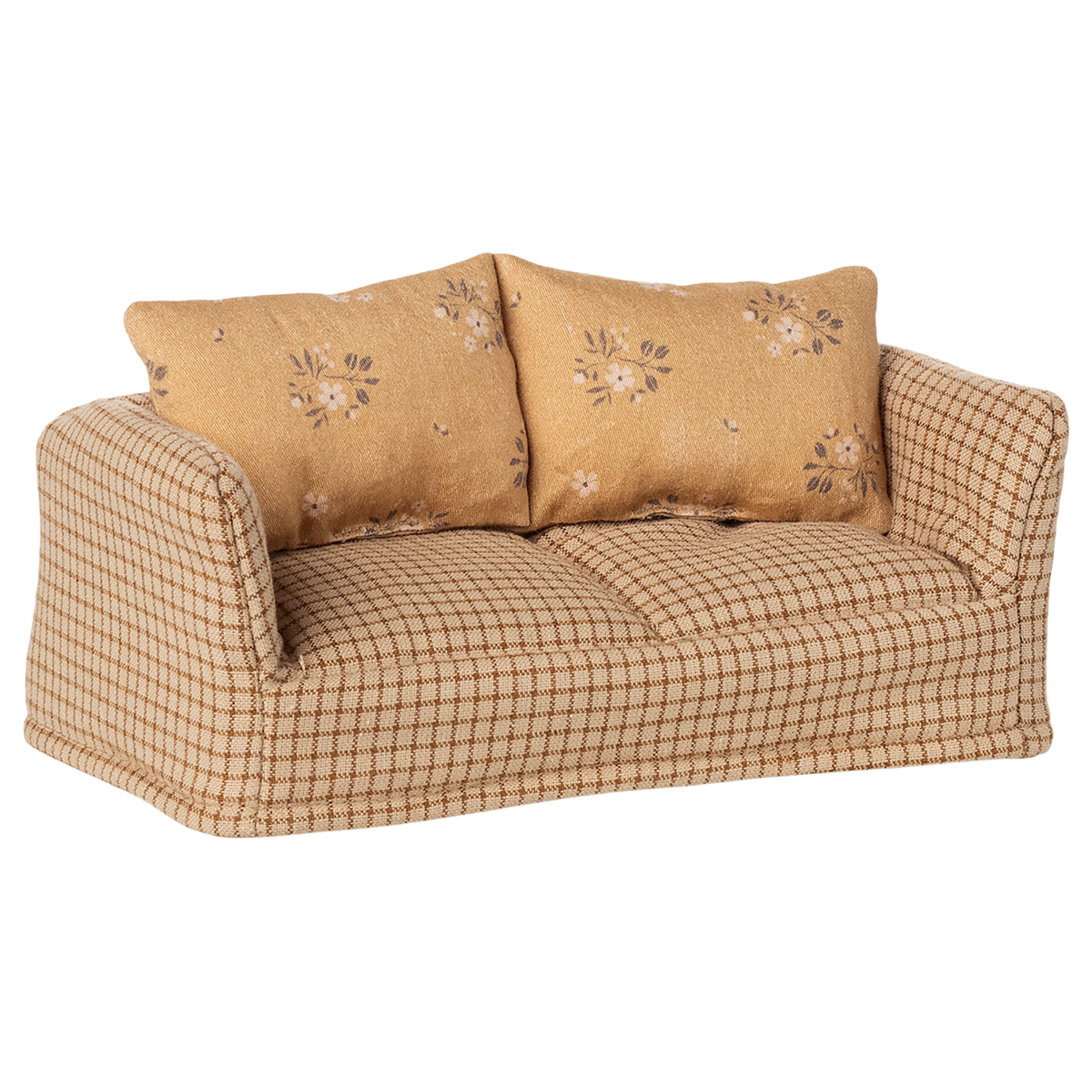 A vintage-style miniature sofa with a beige and brown checkered pattern. It features two floral-patterned cushions, conveying a cozy and nostalgic vibe.