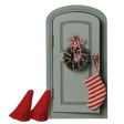 Maileg mouse Christmas door set with miniature green door, wreath, striped stocking, and red hats.