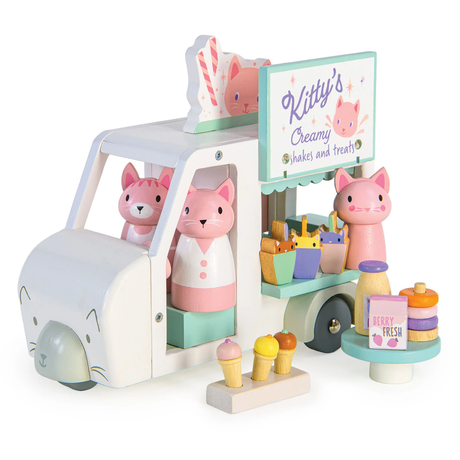 A wooden toy food truck labeled "Kitty's Creamy Shakes" filled with pink cat figures and treats.