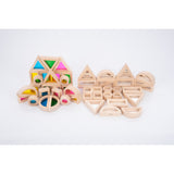 A set of wooden building blocks with mirrored centers, designed to stimulate visual perception, creativity, and block play exploration.