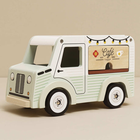 Vintage-style light green and white wooden toy cafe van with a serving counter.