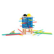 Moulin Roty Giga Bomb wooden game with a blue cylinder, colorful sticks, and marbles on a white background.