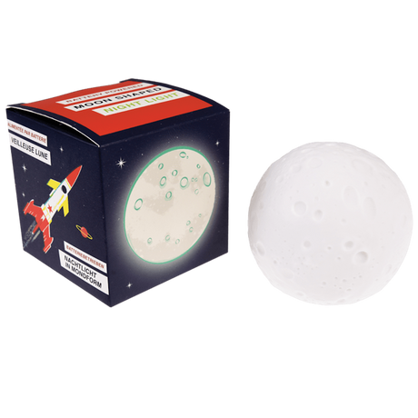Spherical white moon-shaped night light resting next to its dark blue space-themed packaging box.