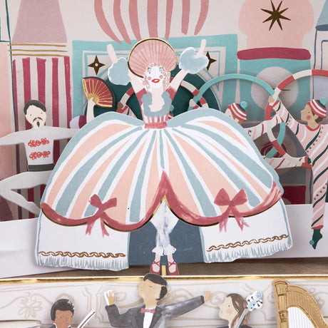 Close-up of Nutcracker theatre advent calendar featuring a ballerina paper puppet on stage.