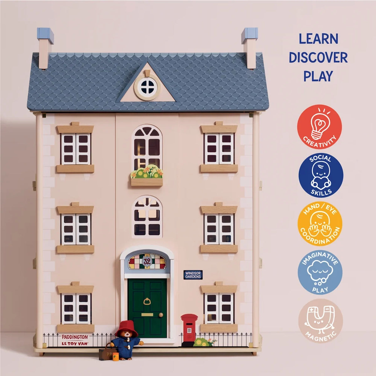 Paddington dollhouse features icons for learning, creativity, and hand-eye coordination.