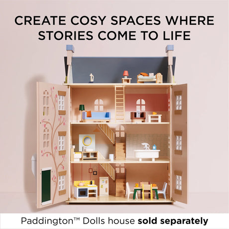 Four-story wooden dollhouse filled with miniature furniture, open to show decorated rooms and stairs.