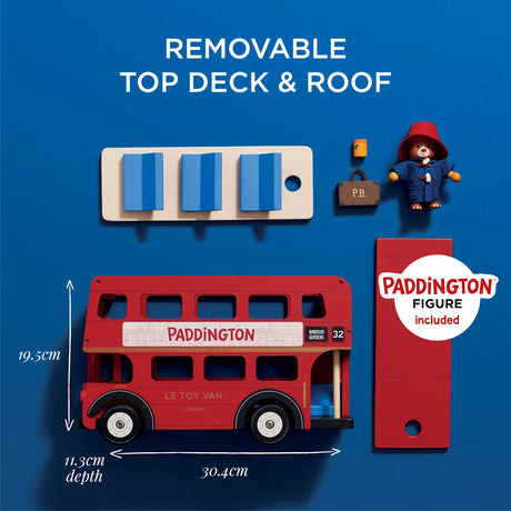 Wooden red London bus toy with removable top deck, roof, Paddington figure, suitcase, and dimensions shown.