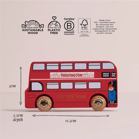 Red wooden Paddington toy bus with dimensions (11.5cm length, 5cm height) and sustainability icons.