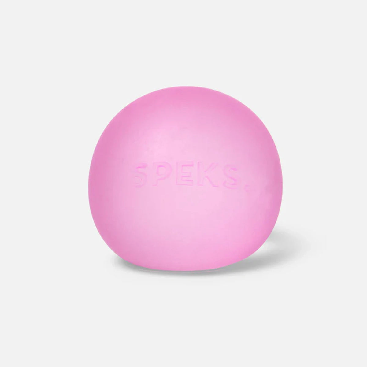 A smooth, solid pink Speks stress ball with embossed brand lettering centered on a white background.