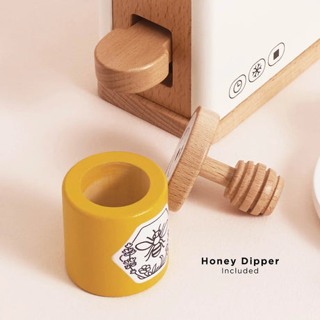 Wooden toy honey pot with a bee illustration and a wooden honey dipper included.