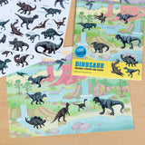 Dinosaur reusable sticker set open on a wooden table showing interactive prehistoric scene sheets.
