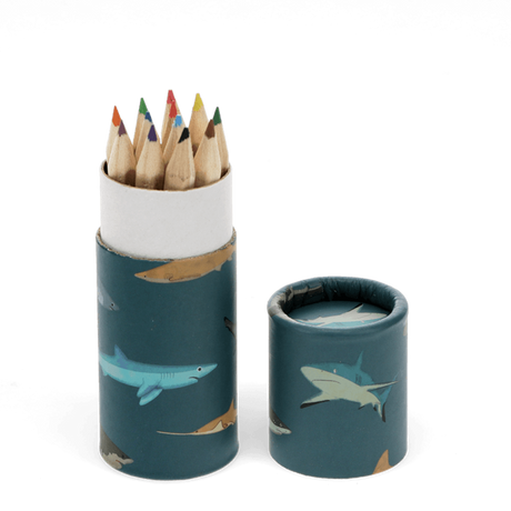 Shark-themed cardboard tube storing colorful mini pencils with lid off against white background.