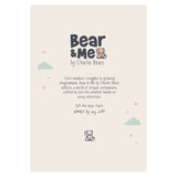 Text card reading "Bear & Me by Charlie Bears" with small teddy bear illustrations, clouds, and stars.