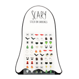 Ghost-shaped card containing a sheet of Halloween stick-on earrings with various spooky designs.