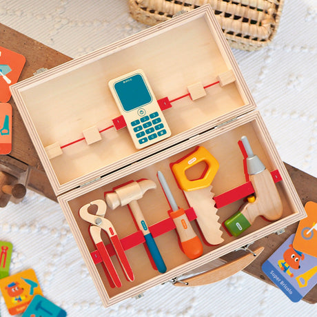 Djeco wooden tool box set with toy hammer, drill, saw, and phone for toddler pretend play.