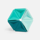Hexagonal silicone fidget toy featuring triangular segments in three shades of teal.