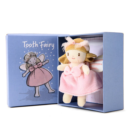 Small plush tooth fairy doll in a pink dress sitting inside an open blue gift box.
