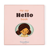Pink gift box for "my say Hello book" featuring a girl's illustration through an oval cutout window.
