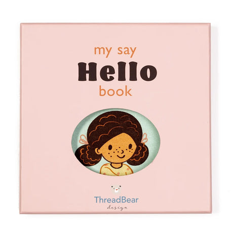 Pink gift box for "my say Hello book" featuring a girl's illustration through an oval cutout window.