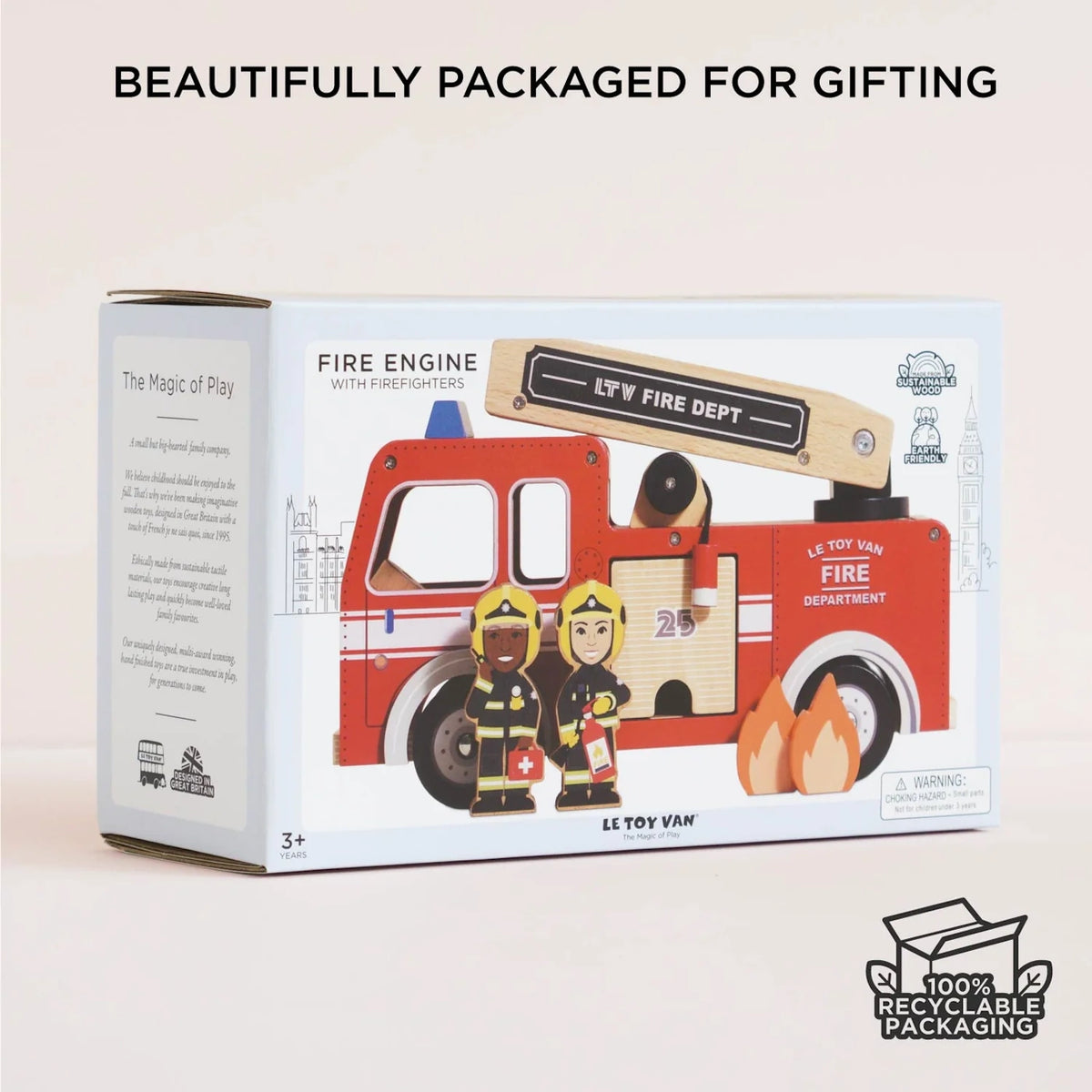 Le Toy Van wooden fire engine toy with two firefighter figurines in gift packaging.
