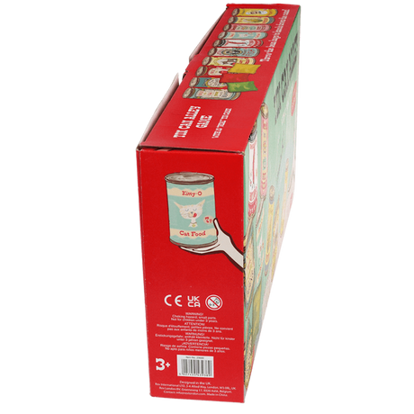 Side view of a red and green Tin Can Alley game box showing safety warnings and product details.