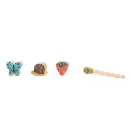 Moulin Roty wooden shape sorter pieces and xylophone mallet from the turtle activity toy.
