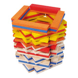 Vilac wooden Batibloc set building a colorful tower with stacked red, yellow, orange, and natural blocks.