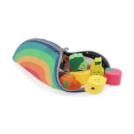 Wooden fruit and vegetable lacing beads spilling out of a colorful rainbow zippered pouch.