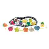 Wooden fruit and vegetable lacing beads threaded on a string with an open patterned storage bag.