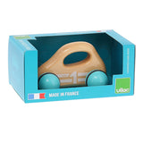 Vilac natural lacquered wood baby car toy with turquoise wheels in a blue box that says Made in France.
