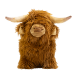 Fluffy brown plush toy resembling a Highland cow, with long fur and curved horns, set against a white background, conveying a cozy and whimsical feel.