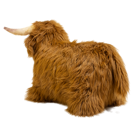 Fluffy brown plush toy resembling a Highland cow, with long fur and curved horns, set against a white background, conveying a cozy and whimsical feel.