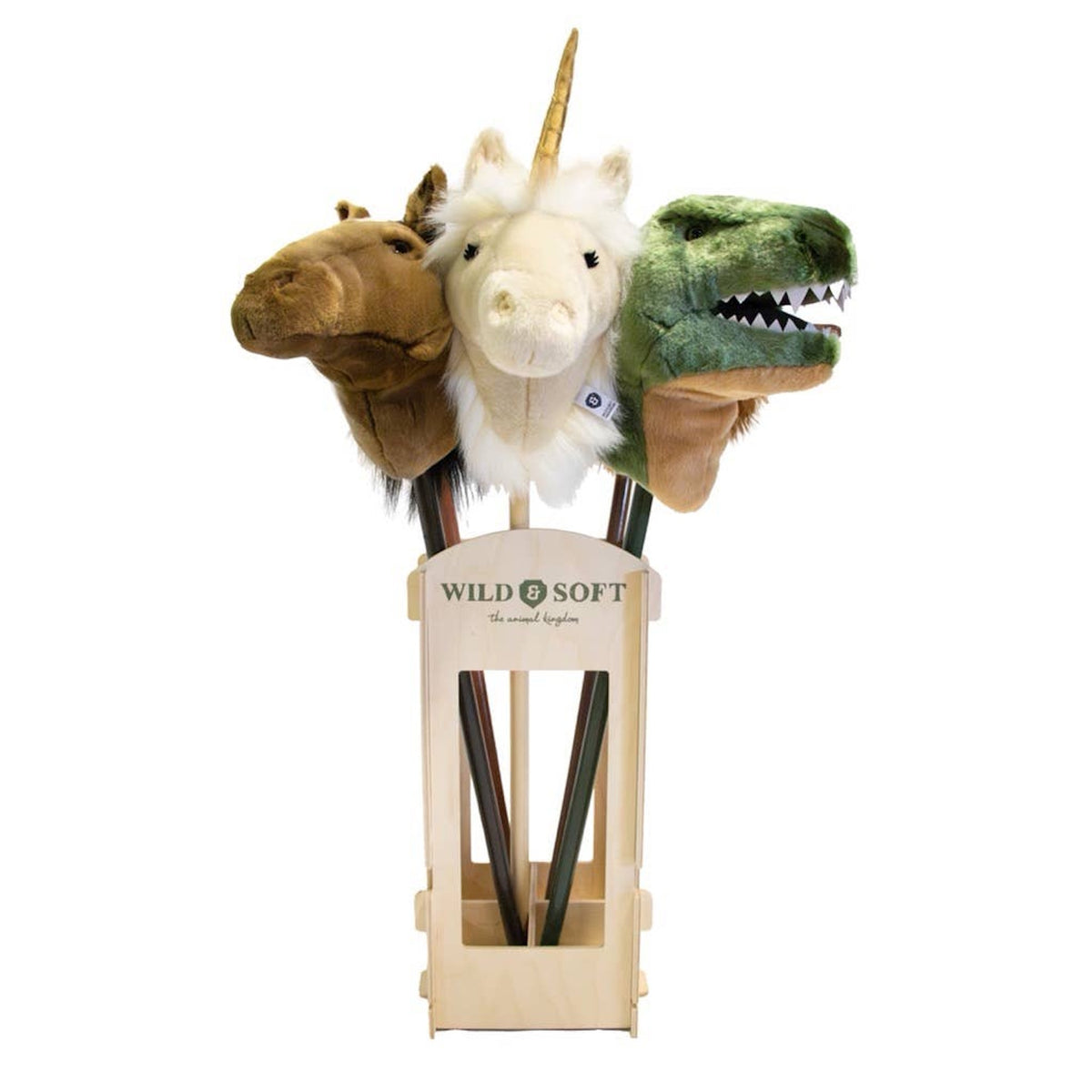 Three plush stick toys in a wooden holder, featuring a brown horse, white unicorn, and green dinosaur, with "Wild & Soft" branding.
