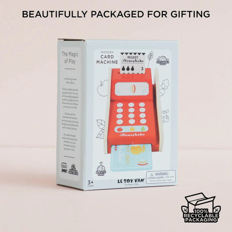 Le Toy Van wooden toy card machine box with a picture of the toy and text reading "Wooden Card Machine".