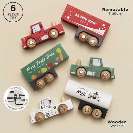 Six-piece wooden toy truck set with three cab trucks and three removable matching trailers.