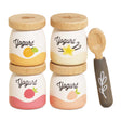 Set of four wooden play yogurt pots with wooden lids and a matching play spoon.